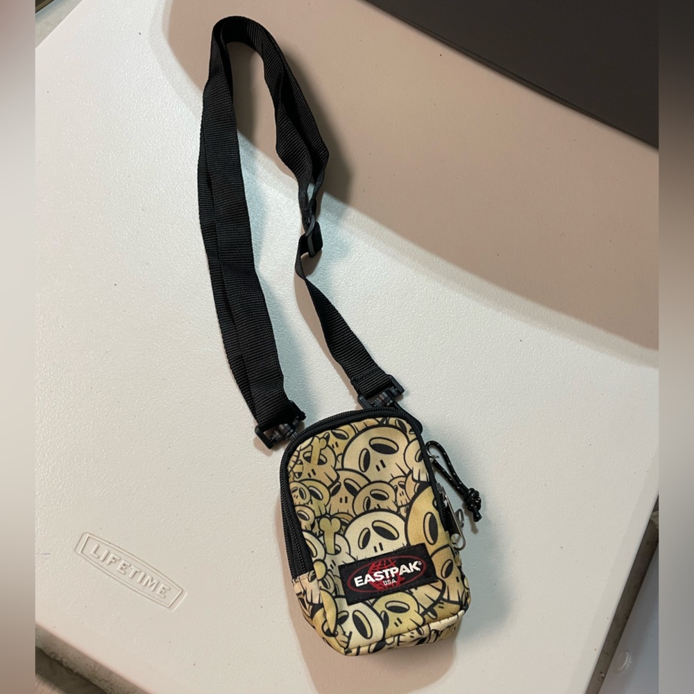 Eastpak Tan and Black Belt Bag Compact and Stylish